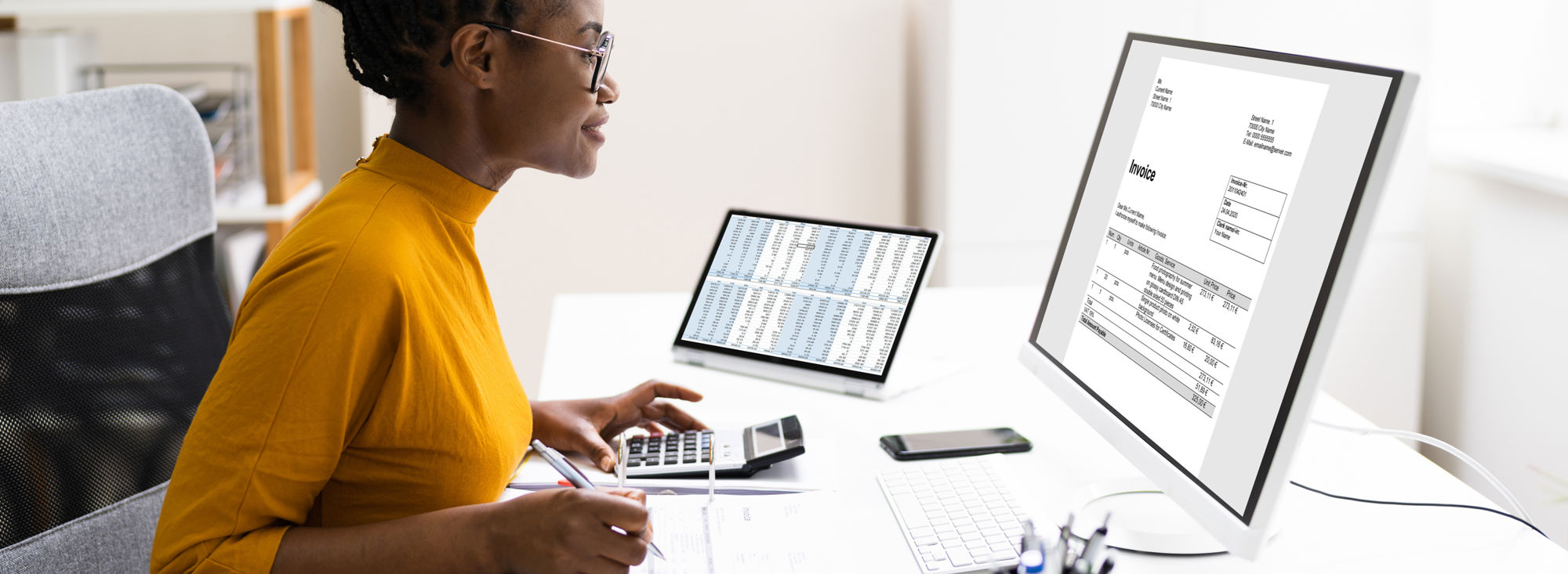 Accountant Working On A Computer
